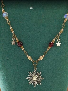 Gold-Tone Sun Pendant Necklace with Red Beads and Gold Accents - Women Jewelry